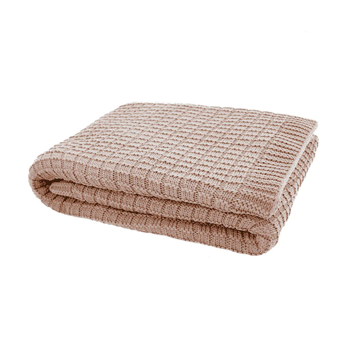 The Tanami Knitted Throw in Latte Brown measures 130cm x 200cm perfect to drape at the end of your bed