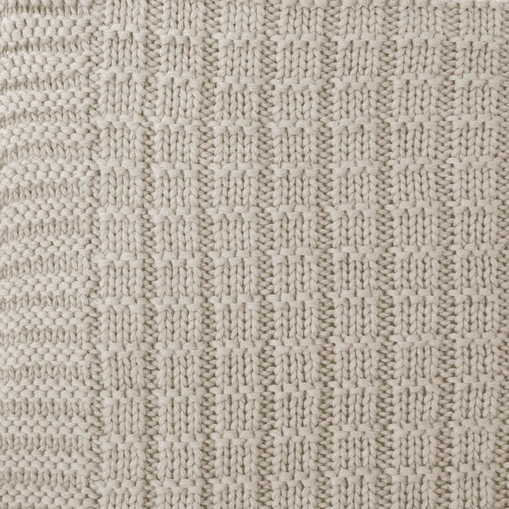 The gorgeous knitted pattern of Tanami Throw in Stone Neutral Brown with a knitted pattern measuring 130cm x 200cm.