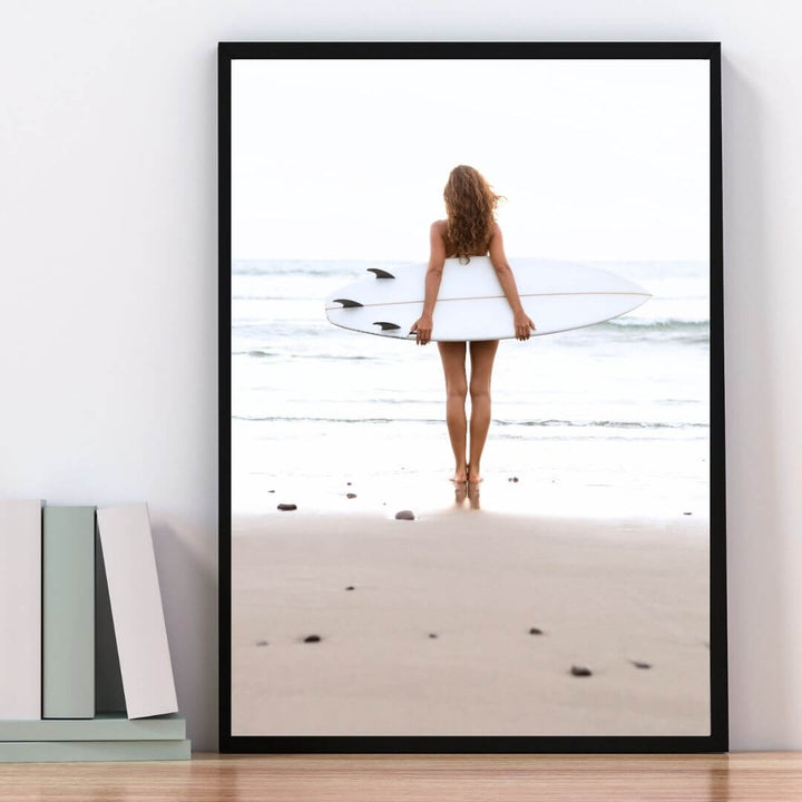 A wall art photo print of the girl with the surfboard with a black frame or unframed for your study office wall