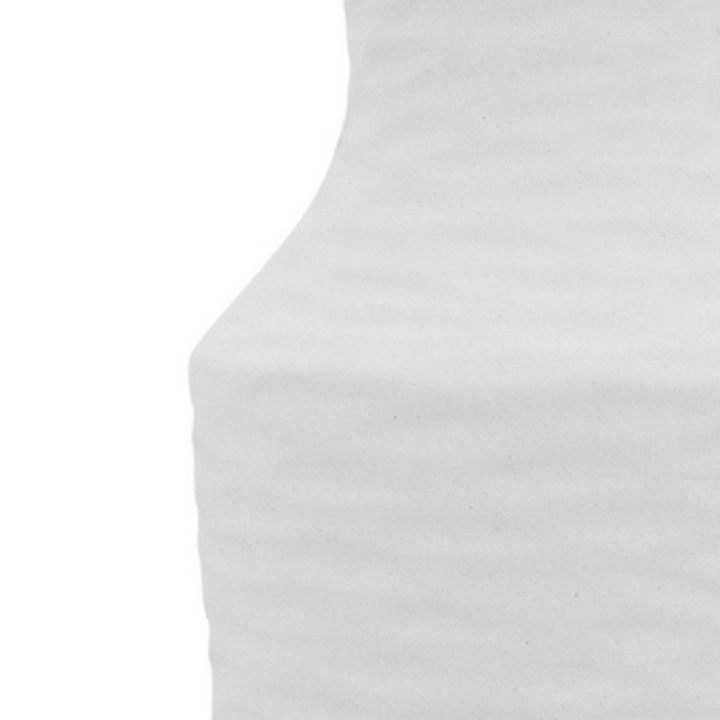 A Kima large White Vase for your coastal, beach home with natural curves.