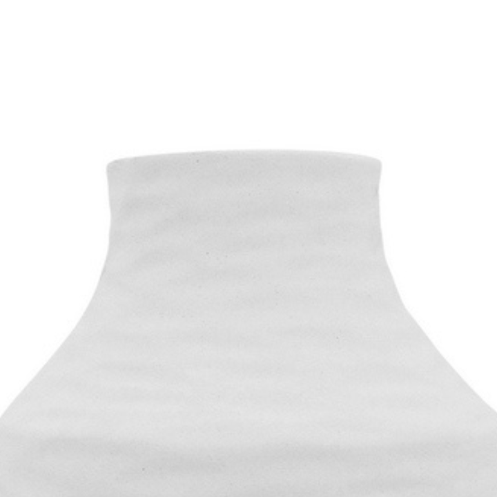 With her gorgeous natural curves,  wavy textured matt pattern, the Kima Large White Vase adds a coastal vibe to your home decor.