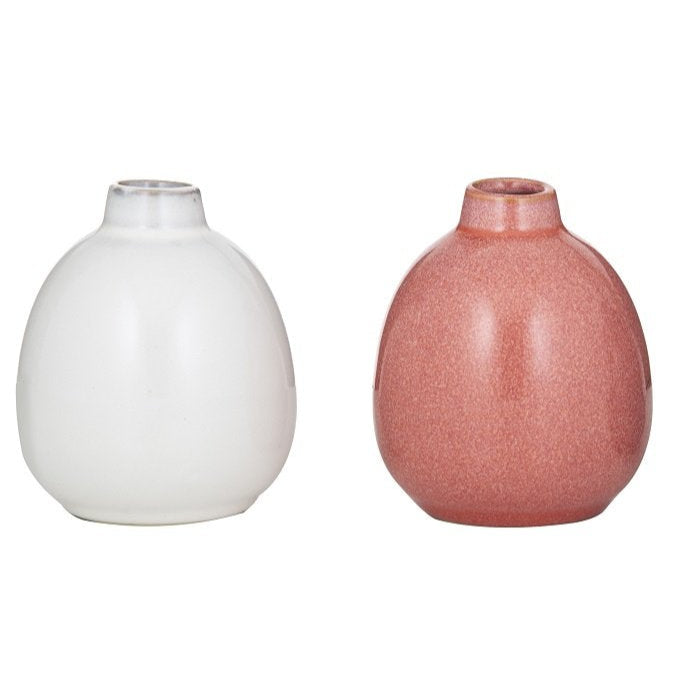 10cm Nya small cream ceramic vase next to a 10cm Nya small pink ceramic vase
