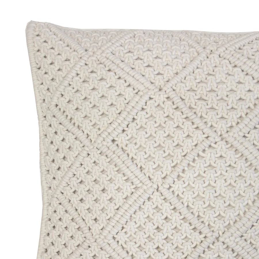 The 45cm Anka Square Cushion with a hand crafted diamond macrame pattern is in an Ivory Colour