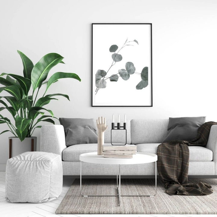 A wall art photo print of an Australian native eucalyptus leaves B with a black frame or unframed to decorate a wall in your living room