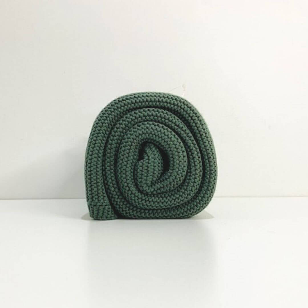 A gorgeous lusciously soft Mini and Me Cable Knitted Baby Blanket in beautiful Forest Green Colour to keep your baby comfortable and cosy.