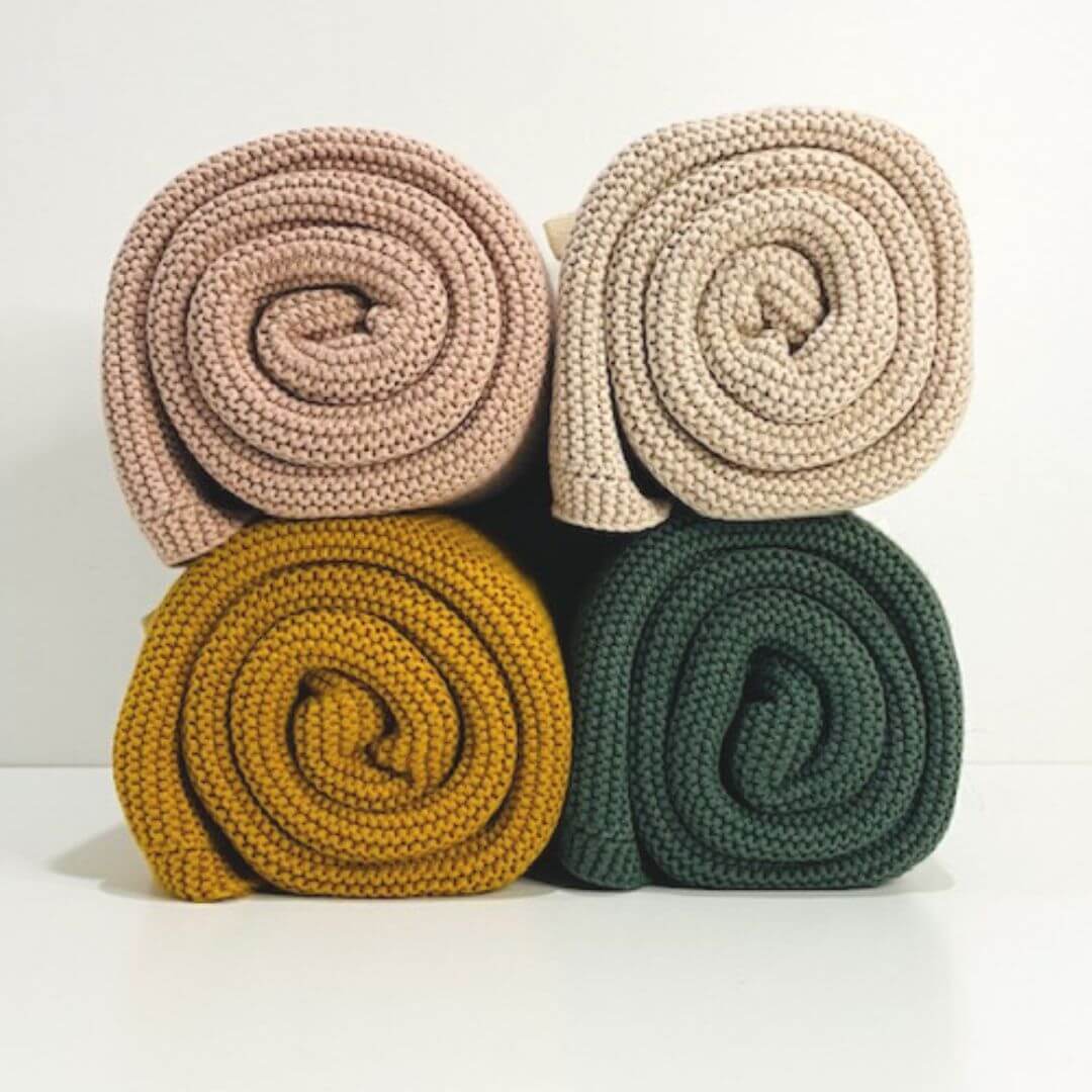 Wrap your baby in a lusciously soft Mini and Me Cable Knitted Baby Blanket in beautiful Blush Pink.