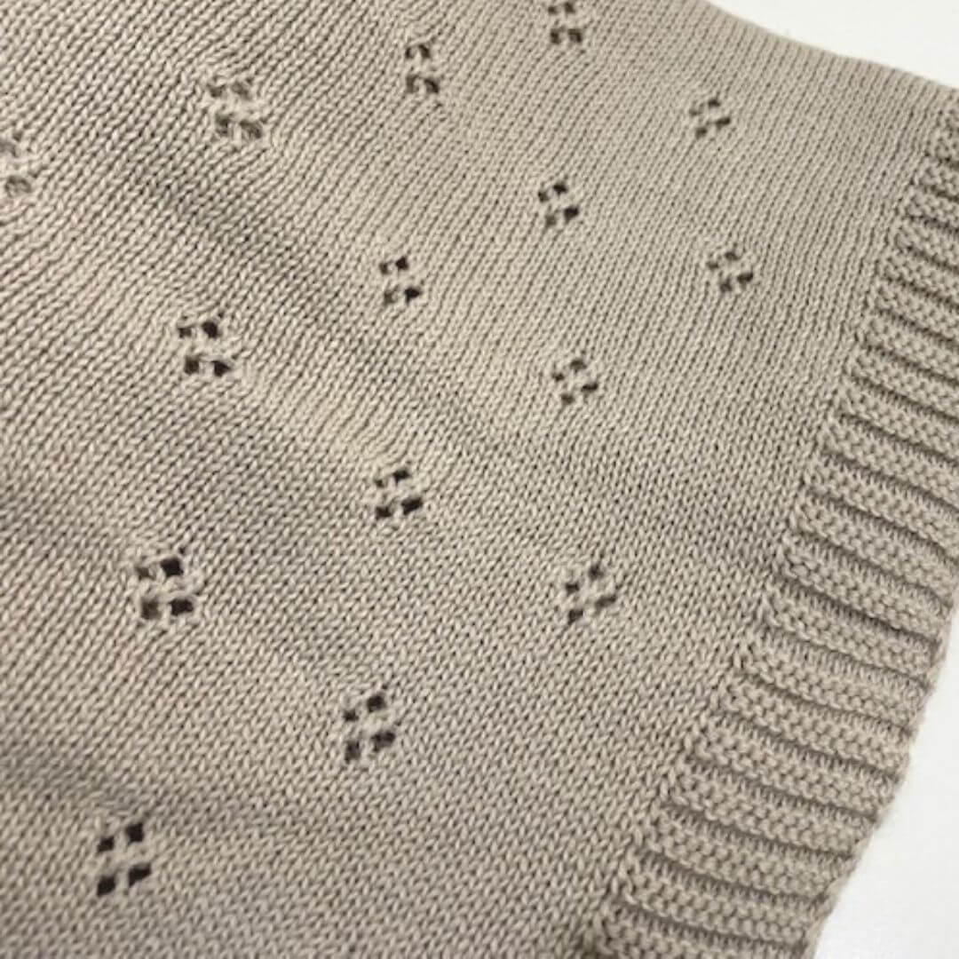 A beautiful lusciously soft Heirloom Knitted Baby Blanket in beautiful Enokia Brown Colour made by Mini and Me to wrap your baby.