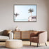 A wall art photo print of a blue beachside kombi van with a black frame, no border on office study room wall