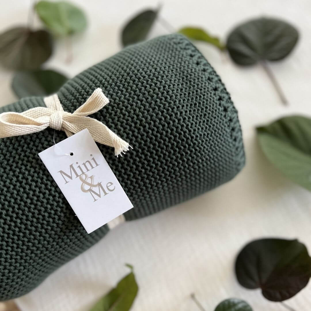 Baby shower gift idea is this lusciously soft Cable Knitted Baby Blanket in beautiful Forest Green Colour , made by Mini and Me, to keep you little one warm Beautiful Home Decor for the baby's nursery.