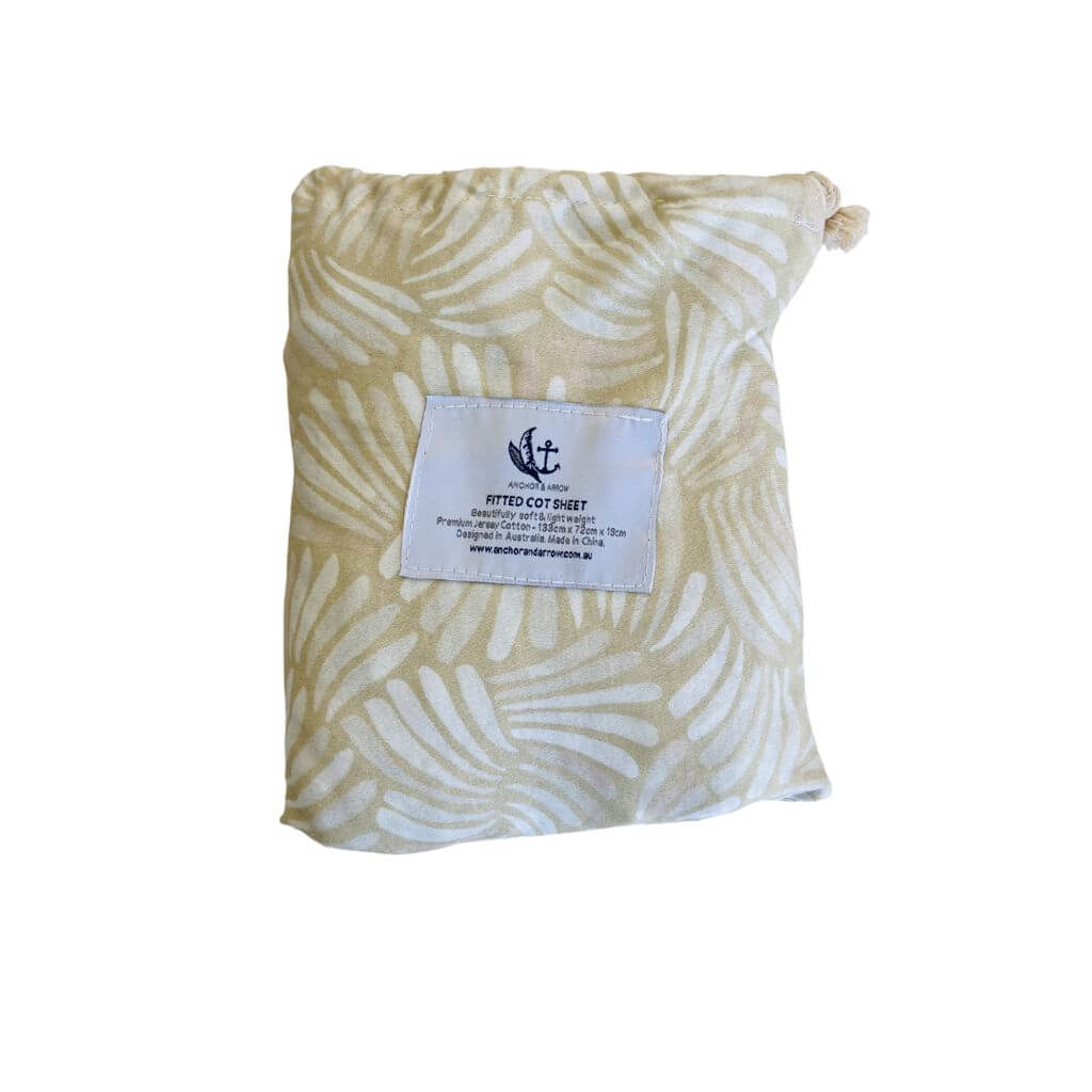 A lightweight pink Jersey Cotton Fitted Baby Cot Sheet in a coastal Sandy Shell pattern.