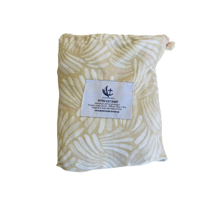 A lightweight pink Jersey Cotton Fitted Baby Cot Sheet in a coastal Sandy Shell pattern.