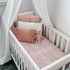 A super soft and light weight gorgeous Jersey Cotton Baby Cot Sheet in a gorgeous Palm Pink design.