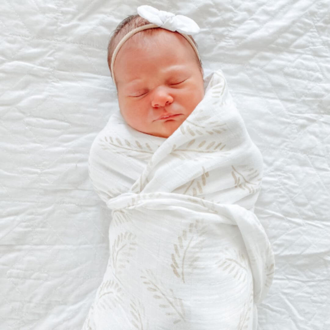 Keep your baby cosy and comfortable with a 100% Organic Bamboo Cotton Swaddle in a beautiful Gold Fern 