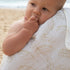 Wrap your baby in comfort with an Organic Bamboo Cotton Swaddle in a beautiful Gold Fern design.