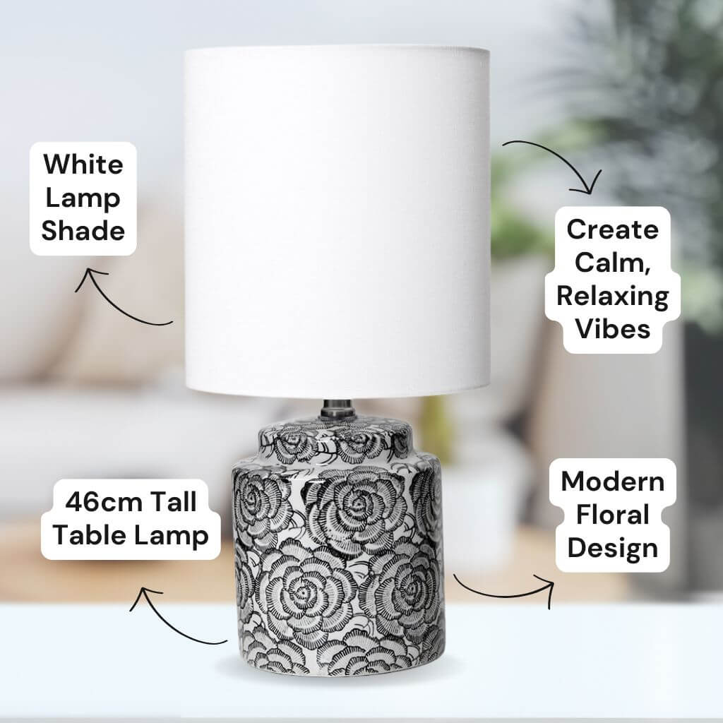 Gorgeous Camellia Table lamp with her white lamp shade and black floral base.