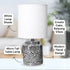 Gorgeous Camellia Table lamp with her white lamp shade and black floral base.