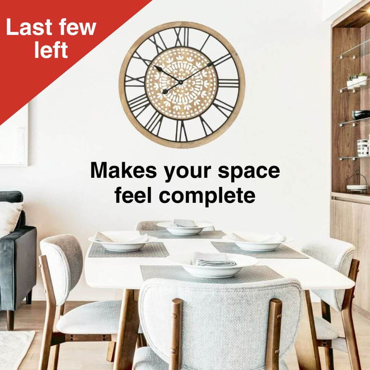 Dining room with a large wall clock and text overlay 'Last few left. Makes your space feel complete'.