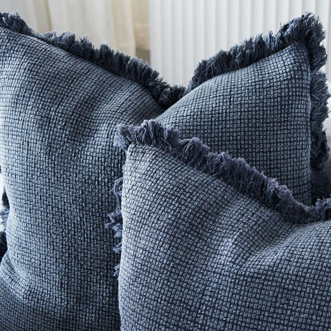 A set of 2 navy blue Square 60cm Chelsea Fringe Cotton Cushions with a Throw for your Coastal Hamptons Australian home decor.