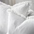 A set of 2 off white Square 60cm Chelsea Fringe Cotton Cushions with a Throw for your Coastal Hamptons Australian home decor.