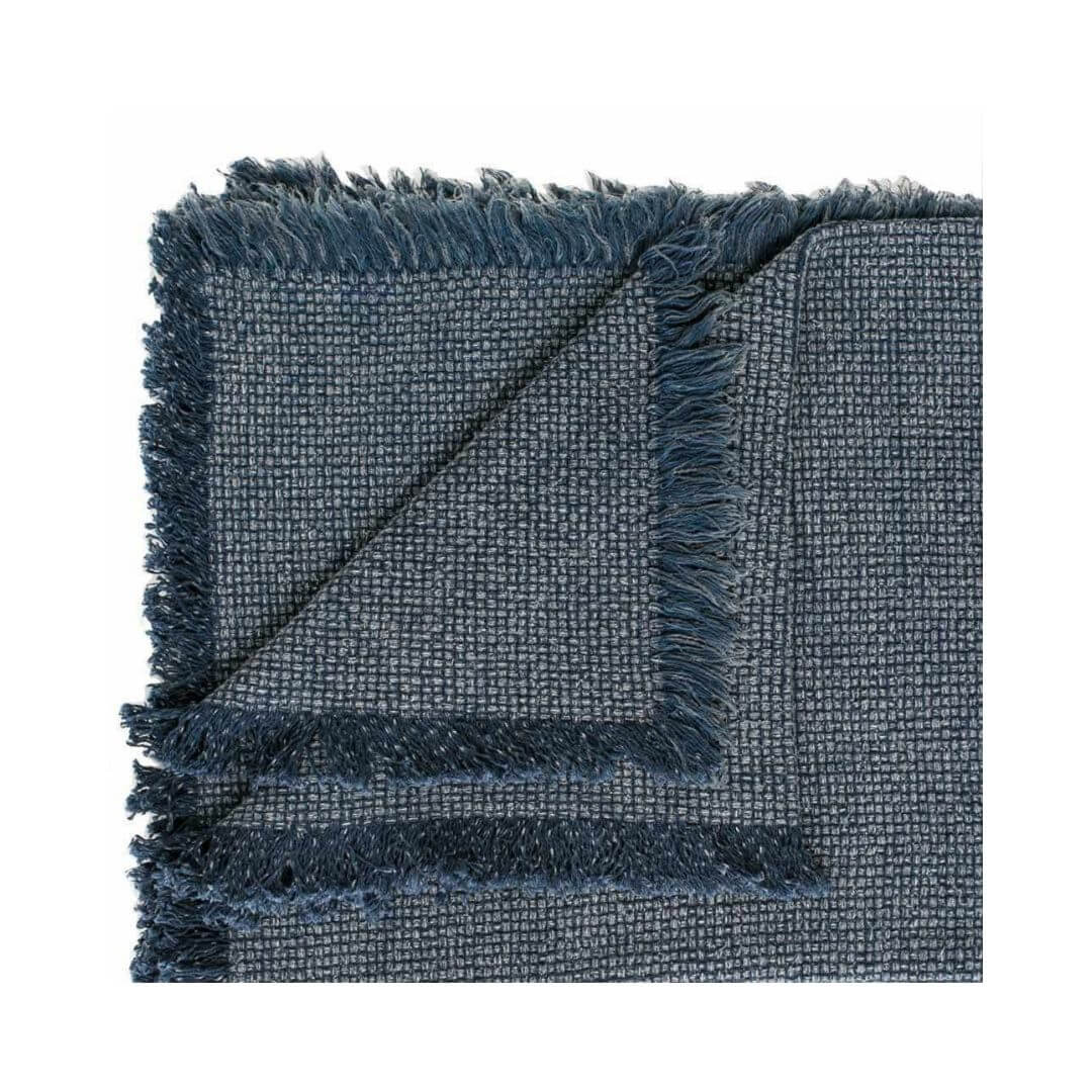 A navy blue Chelsea Cotton Throw with fringe measuring 150cm x 180cm