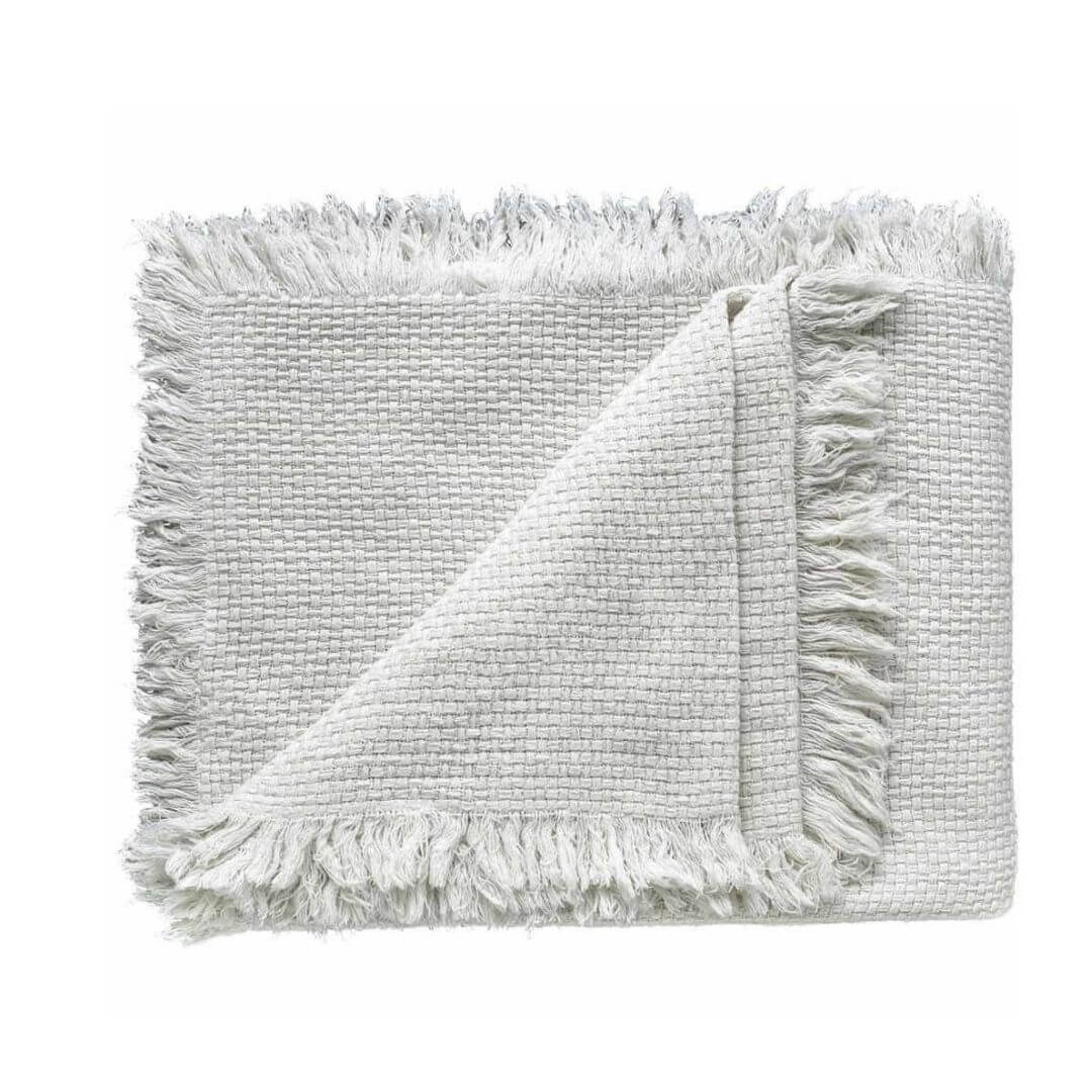 A gorgeous off white throw part of the Rectangle 40cm x 60cm Chelsea Fringe Cotton Cushion and Throw Bundle Set