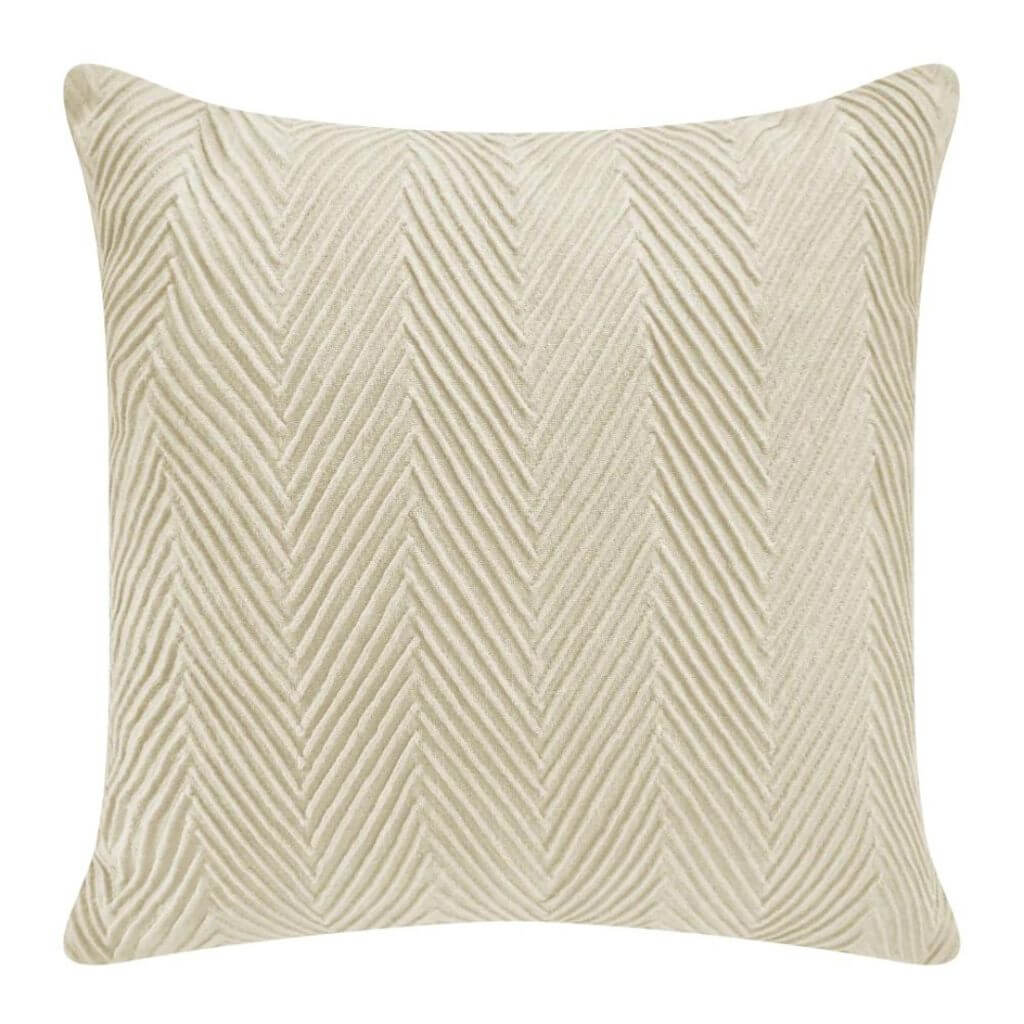 The cream Chevvy Cushion with a chevron pattern, measuring 50cm square to style your bed or sofa.