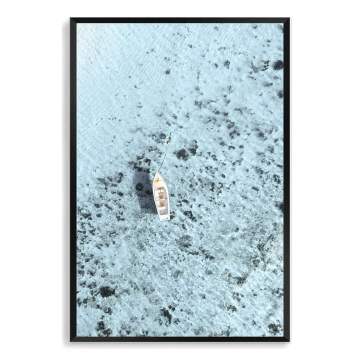 A wall art photo print of a white boat on a clear blue ocean off the Amalfi Coast Italy with a black frame, no white border at Beautiful Home Decor