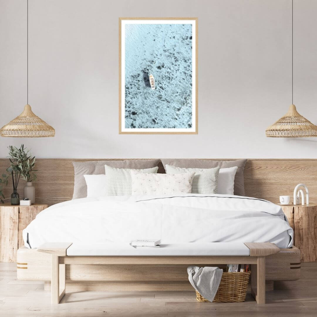 A wall art photo print of a white boat on a clear blue ocean off the Amalfi Coast Italy with a timber frame or unframed for your bedroom empty walls