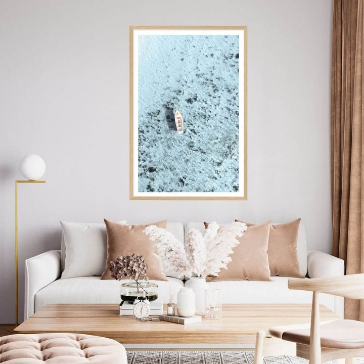 A wall art photo print of a white boat on a clear blue ocean off the Amalfi Coast Italy with a timber frame for the living room by Beautiful Home Decor