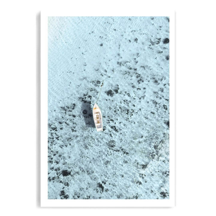 A coastal wall art photo print of a white boat on a clear blue ocean off the Amalfi Coast Italy unframed with a white border by Beautiful Home Decor