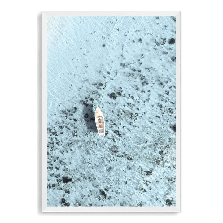 A wall art photo print of a white boat on a clear blue ocean off the Amalfi Coast Italy with a white frame, no white border at Beautiful Home Decor
