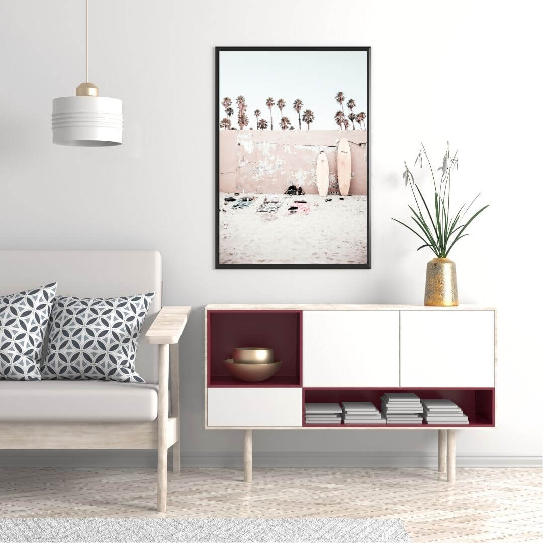 A Coastal Surf Beach Wall Art Print with surfboards with a frame in black to style a wall in your living room