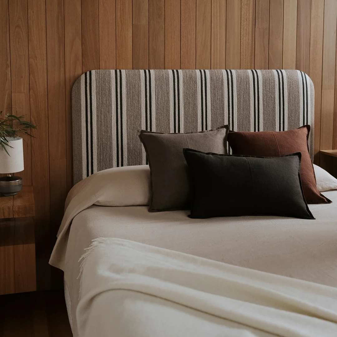 Como Linen Square and Lumbar Cushions decorating a bed