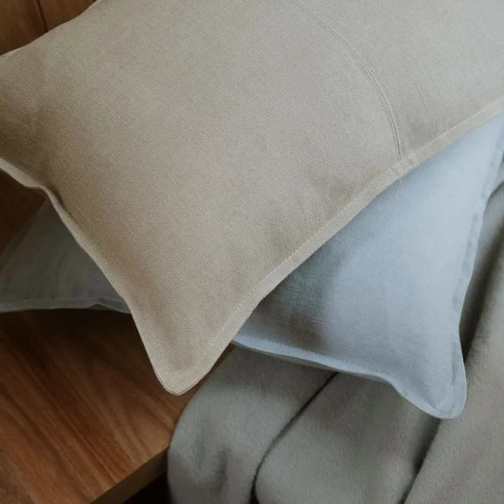 Closeup of a como square and lumbar rectangle linen cushion