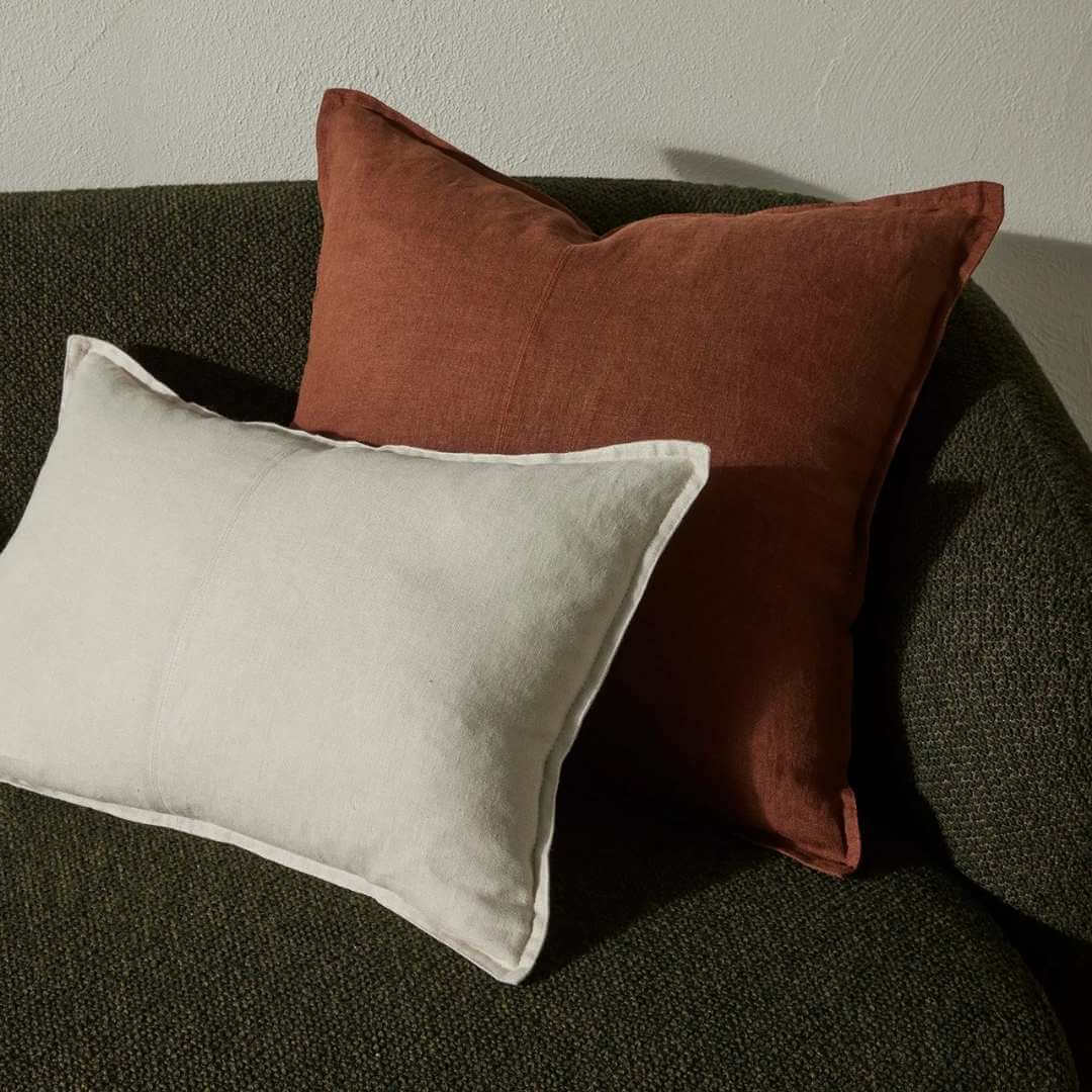 Como Lumbar Rectangle and Square Linen cushion on a sofa in a living room