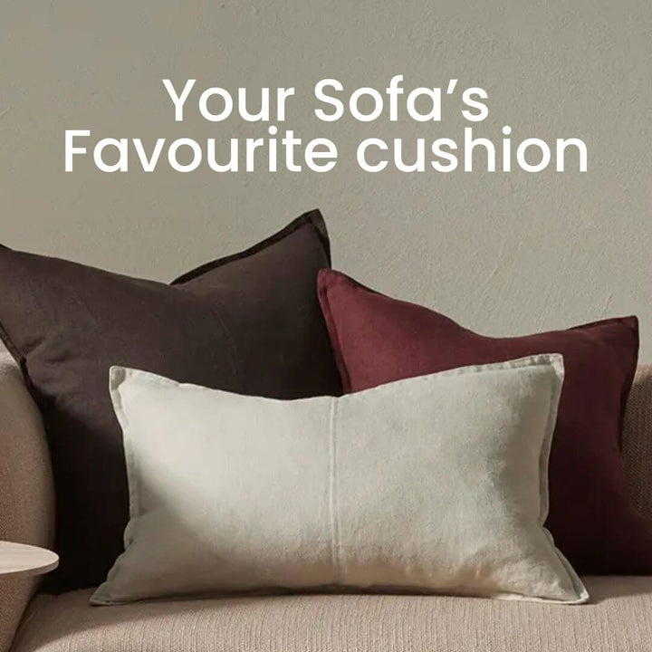 Como 60cm, 50cm Square and 40cm Lumbar rectangle Linen cushions in brown red and cream on a sofa
