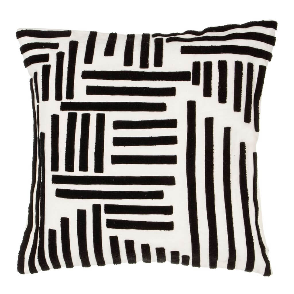 An elegant Crossroads Cushion is a white cotton cushion with black acrylic trim in a crossroads pattern, Adding texture and pattern to your living space with style.