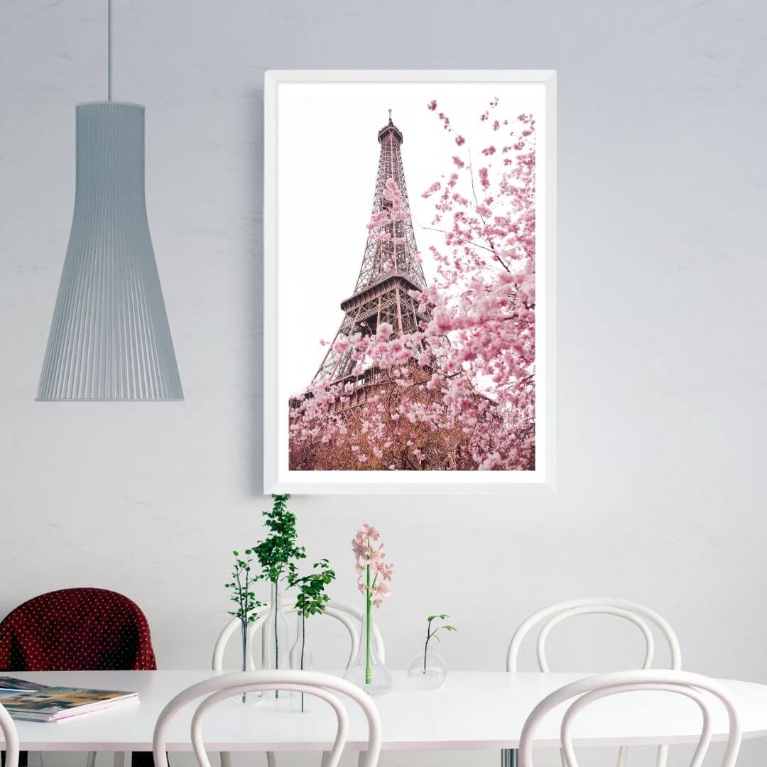 A wall art photo print of the Eiffel Tower in Spring with a white frame or unframed to decorate a wall next to your dining table