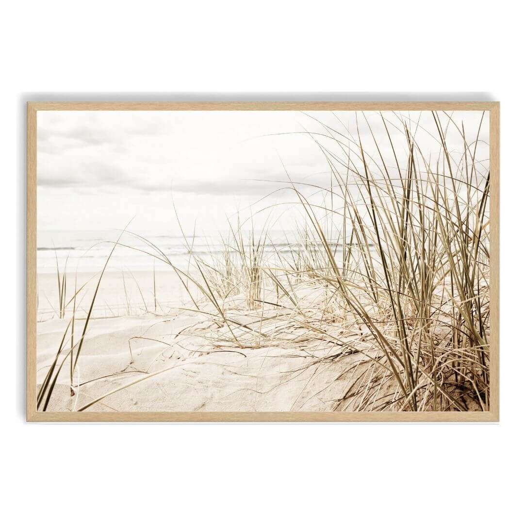 A wall art photo print of a grassy beach shore with a timber frame, no white border at Beautiful HomeDecor