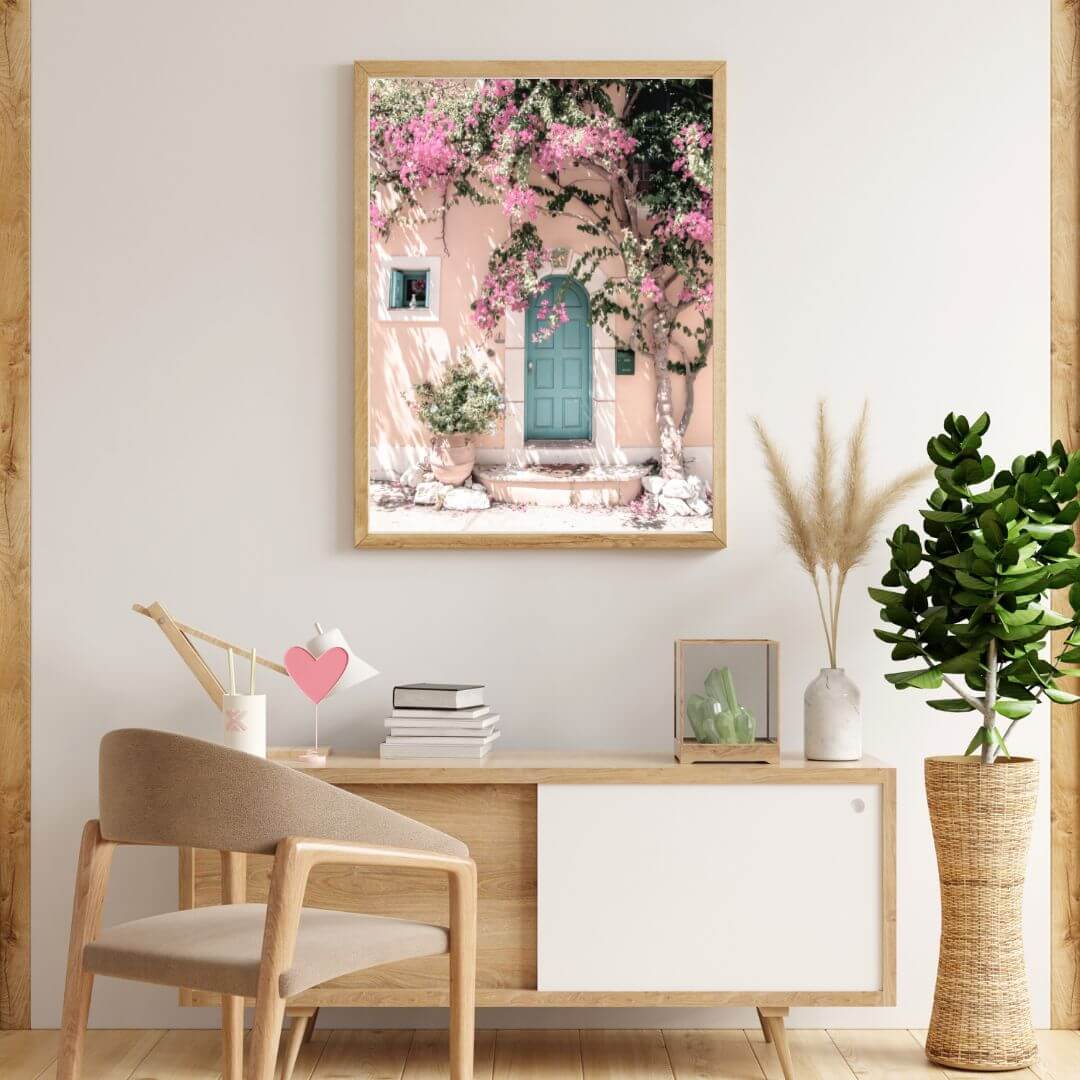 A Greek Pink Villa with Green Door Wall Art Photo Print on a wall by Beautiful Home Decor