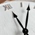 A large 80cm Hamptons Roman Numeral Rimmed White Wall Clock with black clock hands.