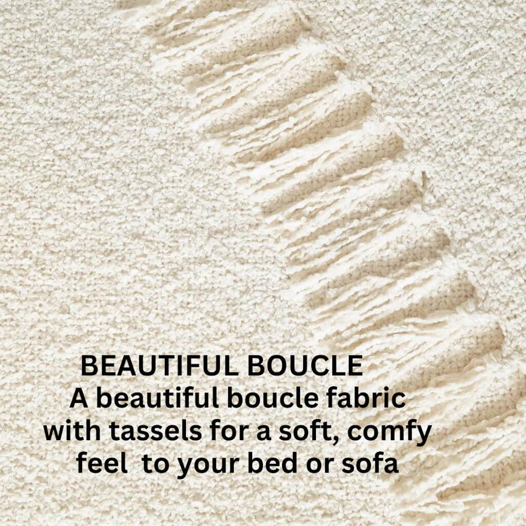 A gorgeous cream Jade Throw with a boucle design and tassels , measuring 130cm x 160cm to decorate your bed or sofa.