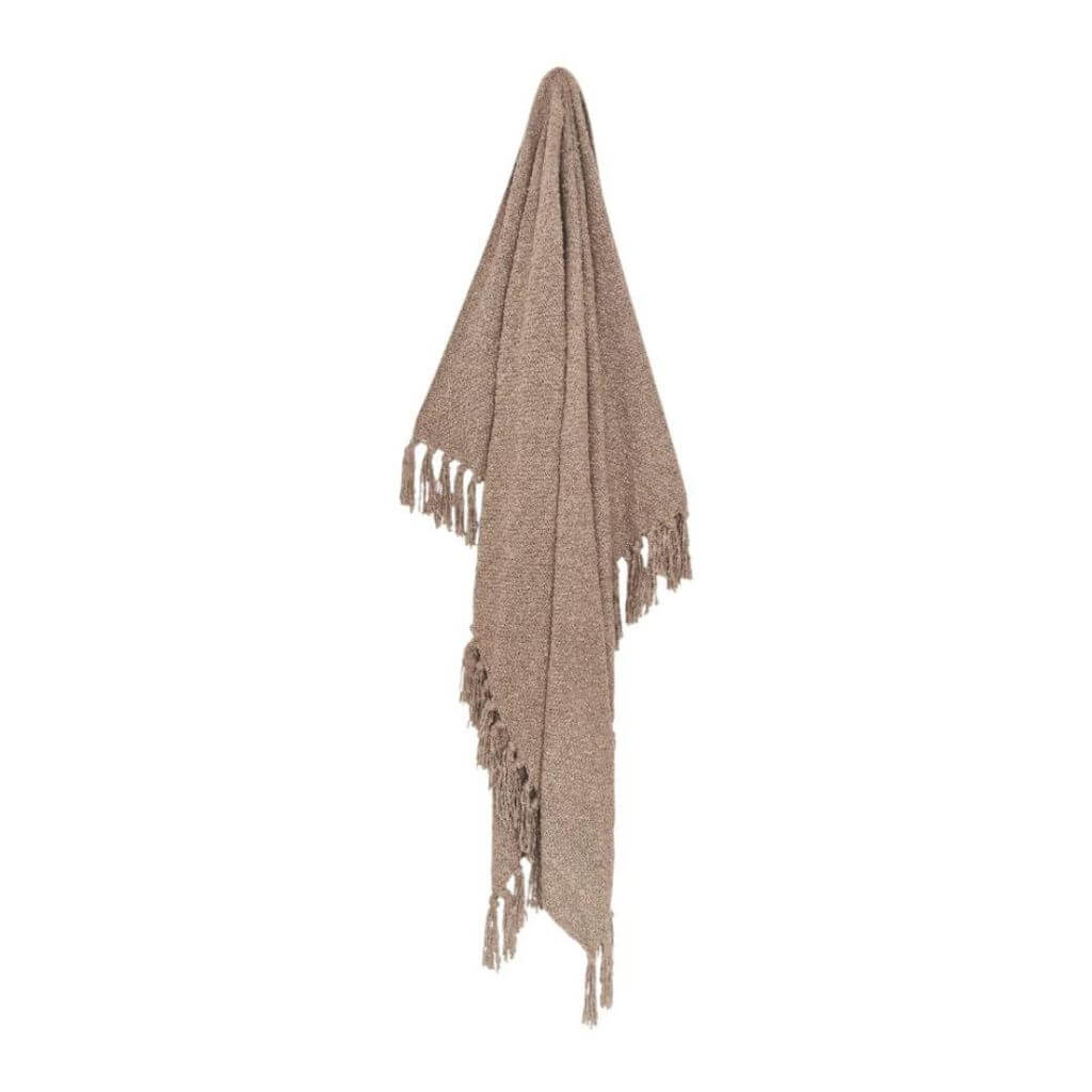 A stylish Jade throw in warm taupe with a boucle pattern and tassels, measuring 130cm x 160cm, to decorate your bed or sofa.