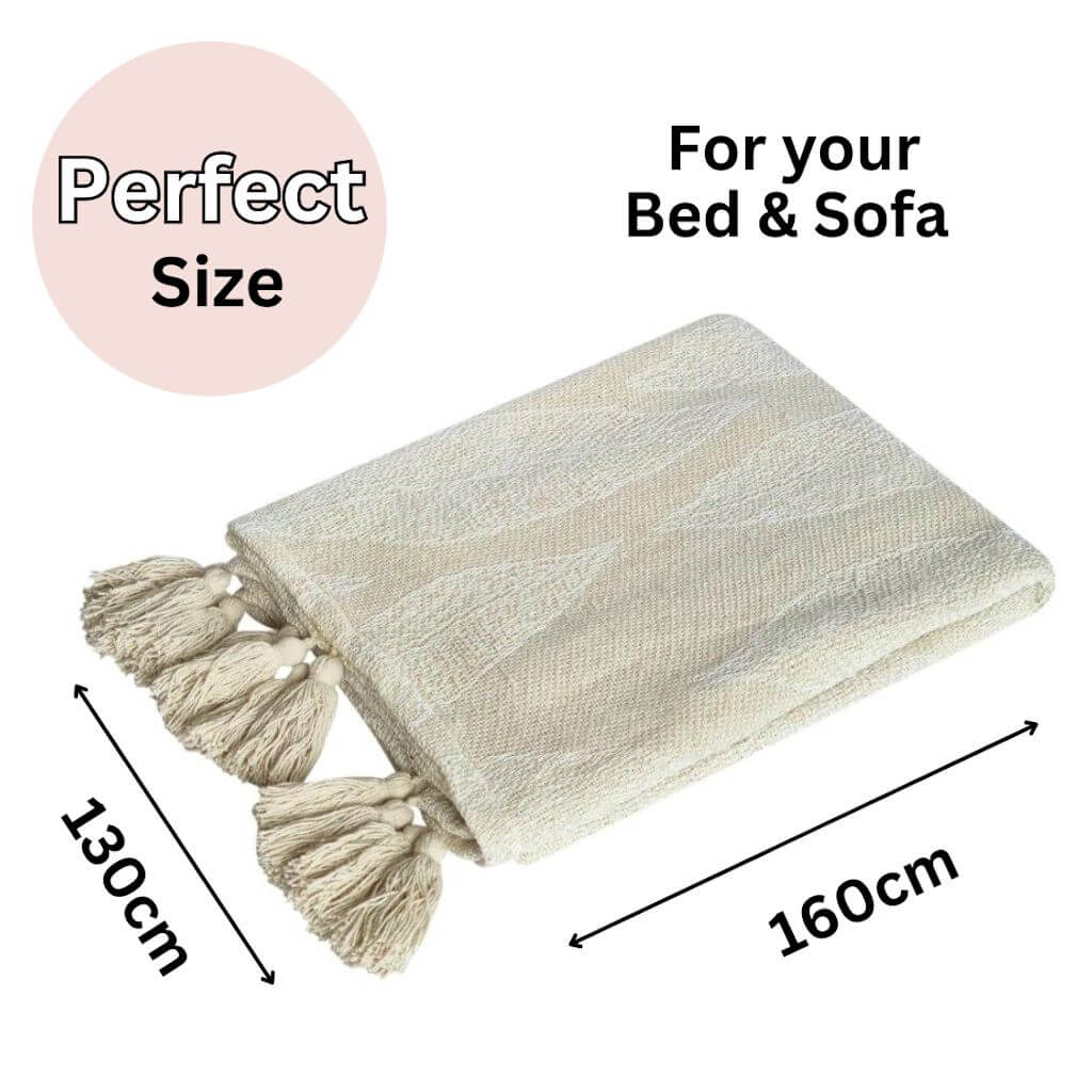The Kye Cotton Throw in cream and ivory white with a leaf pattern on both sides, measures 130cmx 160cm perfect to style your bed or sofa.
