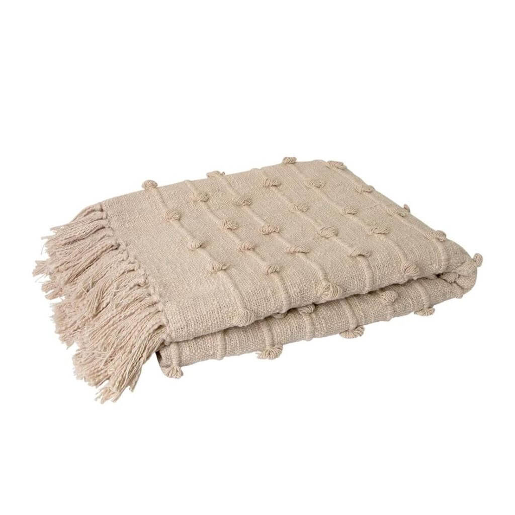 The Liza Throw in Oatmeal brown measures 130cm x 170cm, the perfect size to style your bed or sofa.