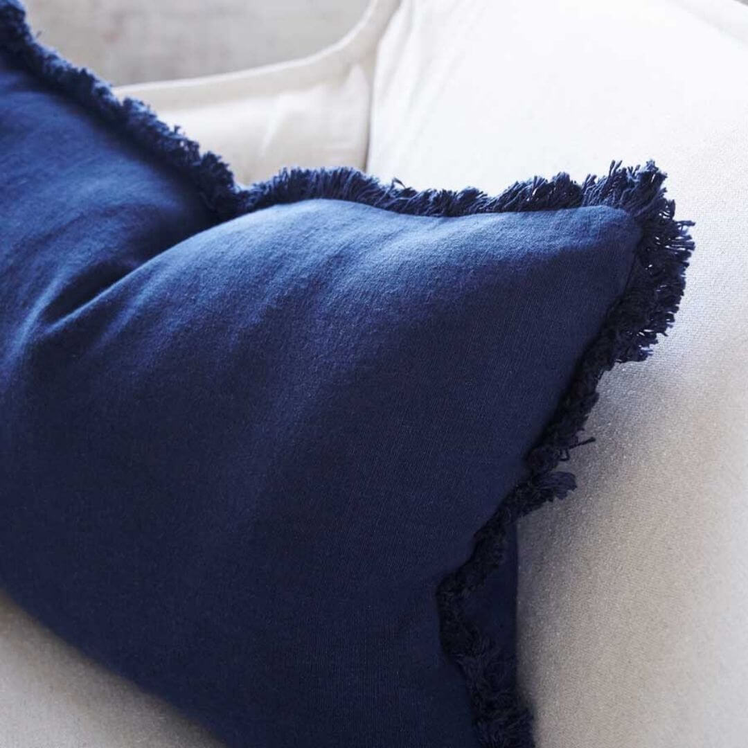 A close up of the edging on the Navy Blue Rectangle 40cm x 60cm Luca Boho  Boho Fringe Cushion