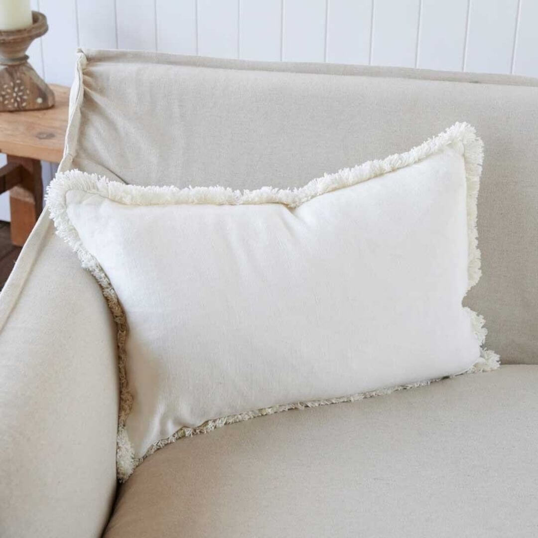 Add casual texture to your home with the Rectangle 40cm x 60cm Luca Boho  Boho Fringe Cushion in white
