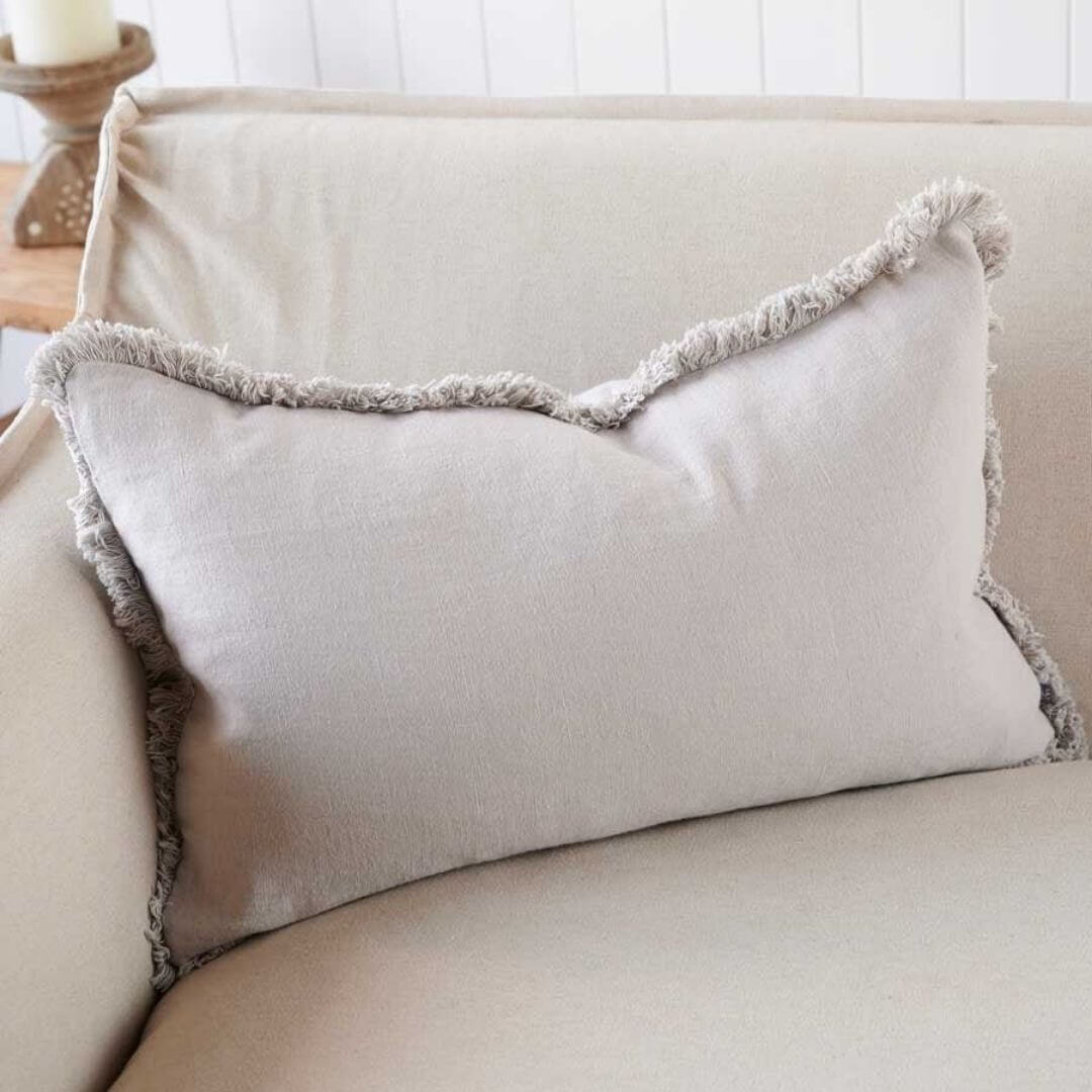A close up of the edging on the Silver Grey Rectangle 40cm x 60cm Luca Boho  Boho Fringe Cushion