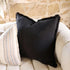 Mix and match a black Square 60cm Luca Boho Fringe Cushion with a throw and cushions on your bed.