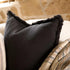 Mix and match a black Square 50cm Luca Boho Fringe Cushion with a throw and cushions on your bed.